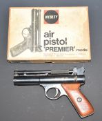 Webley Premier .22 air pistol with wooden grips and original Bakelite grips, in original box.