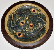Moorcroft framed charger decorated in the Peacock Feather pattern, dated 96, diameter 30cm