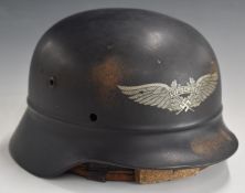German WW2 Third Reich Nazi Civil Defence helmet with 'Luftschutz' logo to front, stamped Q68 and