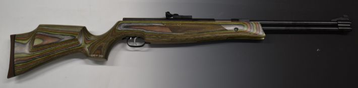 Weihrauch HW77 K .22 air rifle with laminated show wood stock, chequered semi-pistol grip and
