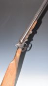Belgian .410 side by side folding poacher's shotgun with chequered grip and forend, carved