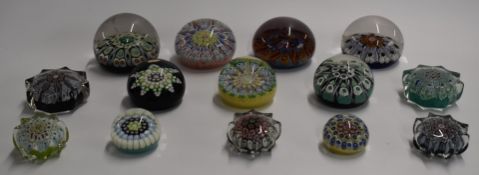 Fourteen Scottish millefiori glass paperweights including Strathearn and Perthshire, some star