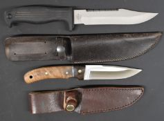 Two hunting or similar knives Kershaw 1010BK with 16cm blade and rubber handle and Whitby with