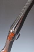 Thomas Turner 12 bore side by side shotgun with scrolling engraving to the locks, trigger guard,