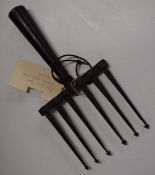 Cast iron pike or fish spear with six arrow tipped spikes, by repute from Thames Head Lock, 33.5cm