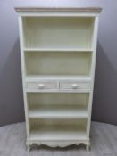 A painted dresser with four shelves, two central drawers and carved decoration W90 X D35 X H180cm