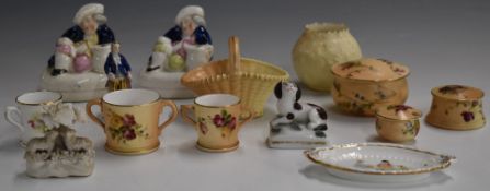 A collection of Royal Worcester miniatures, Staffordshire figural pen holders, Chelsea style