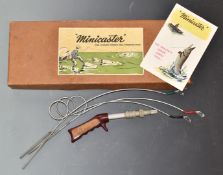 'Minicaster' coiled spring all purpose fishing rod, in box