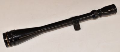 Zieler 8-32x44 rifle scope with screw on metal lens covers.