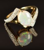 A 9ct gold ring set with an opal and diamonds, size N, 4.2g