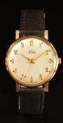 Smiths Astral 9ct gentleman's wristwatch with gold hands and Arabic numerals, cream dial and 17