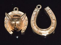 A 9ct gold horseshoe pendant and a 9ct gold horseshoe and fox charm, 4g