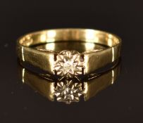 A 9ct gold ring set with a diamond, size P, 1.7g