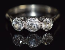 A platinum ring set with three old cut diamonds, total diamond weight approximately 1ct, size M, 3g