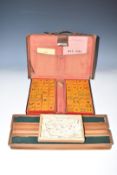 Vintage Mah Jong set in leather case, together with a large quantity of domino or similar bone