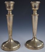 Elizabeth II pair of hallmarked silver candlesticks, Birmingham 1967, maker Charles S Green & Co