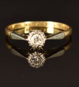 An 18ct gold ring set with a diamond in a platinum setting, size L/M, 2g