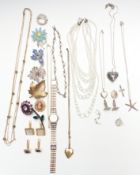 A collection of costume jewellery including silver cufflinks, silver St Christopher, crystal