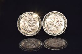 A pair of 9ct gold cufflinks set with a 1965 gold half sovereign and a 1967 gold half sovereign,