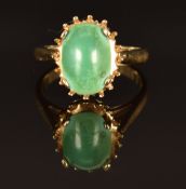 A 14k gold ring set with a turquoise cabochon, size K, 3.4g