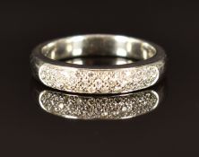 A 14k white gold ring set with diamonds, size N, 5.4g