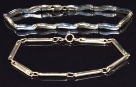 A 9ct gold bi-coloured bracelet and a 9ct gold bracelet, 8.6g