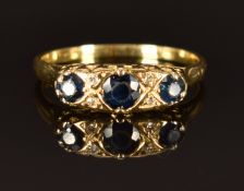 An 18ct gold ring set with sapphires and diamonds, size M, 3.3g