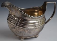 Georgian hallmarked silver milk jug raised on four ball feet, London 1815, maker Thomas Richards,