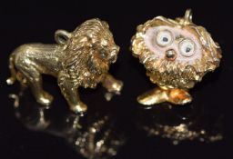 A 9ct gold owl charm and a 9ct gold lion charm, 13.5g