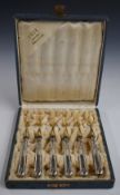 Cased set of Art Nouveau / Vienna Secessionist white metal handled pastry forks with gilt tines, the
