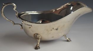 George VI hallmarked silver sauce boat, raised on three hoof feet, Sheffield 1939, maker C W