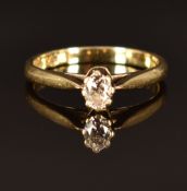 A 9ct gold ring set with an oval cut diamond of approximately 0.2ct, size M, 2.3g