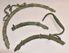 A pair of Roman bronze handles with hand finials and swivel grips, one with mythical creature