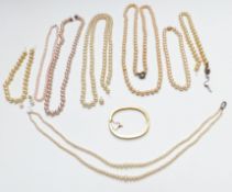 A double strand cultured pearl necklace, a cultured pearl necklace, Swarovski bracelet and faux