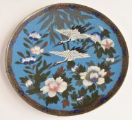 Japanese cloisonné charger with stocks in flight, 30cm diameter.