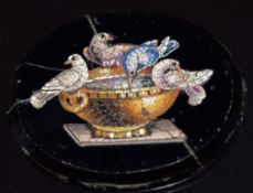 An oval micro mosaic depicting doves at a font
