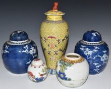 An early 20thC Chinese covered vase, two covered ginger jars etc, tallest 26cm