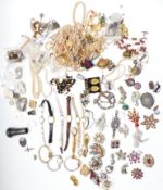 A collection of jewellery including mother of pearl pendant, Chinese white metal handle, silver