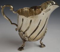 Edward VII hallmarked silver wrythen three footed jug, London 1909, maker Edward Barnard & Sons Ltd,