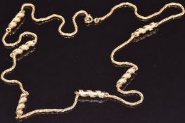 A 9ct gold necklace made up of cylindrical and rope twist links, 22.4g