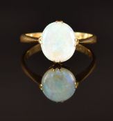 An 18ct gold ring set with an opal, London 1925, size Q, 3.1g