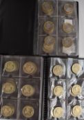 Three Museum Galleries albums of collectable UK £2 coins, mostly single colours, peace and 1986
