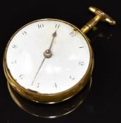 E Woodard of London gold plated open faced pocket watch with gold hands, black Arabic numerals,