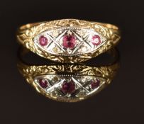 A 9ct gold ring set with rubies and diamonds, size P, 2.1g