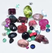 A collection of loose rubies, sapphires and diamonds