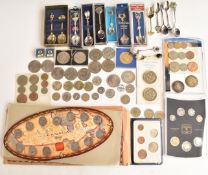 A collection of UK and Canadian coins to include a Millennium set, Coronation sets, modern crowns,