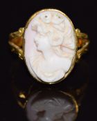 A 9ct gold ring set with a coral cameo, size S, 4.6g