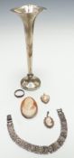 A silver bracelet set with marcasite, silver bud vase, heart locket, silver pendant/ brooch set with