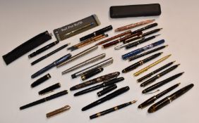 A collection of pens including Parker, Sheaffer and Esterbrook