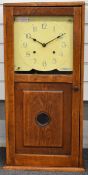 Early 20thC oak cased factory/office building 'slave clock', label to Arabic painted dial